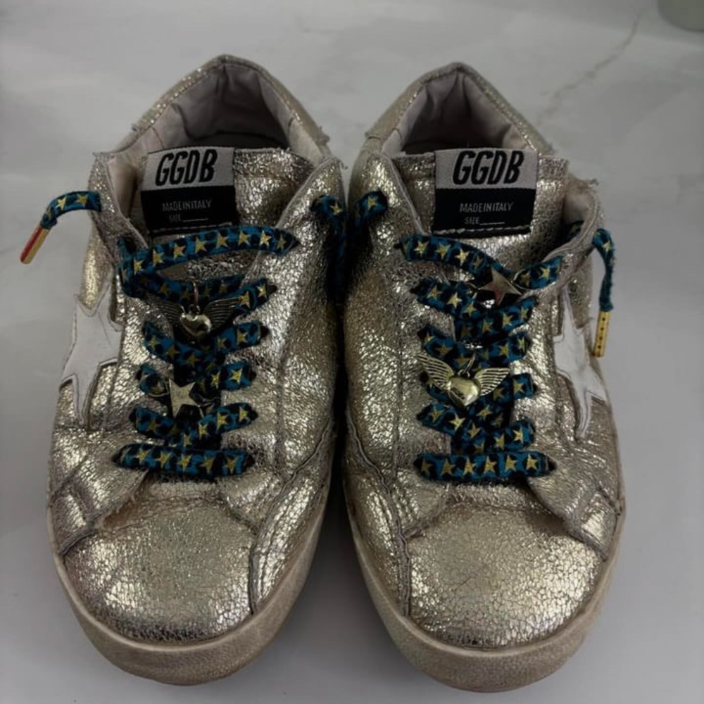 Golden Goose gold color with charms